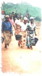 Part of the Women's Group help with the excavation work
