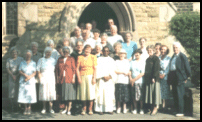 Bishop Esua (centre) on a visit to Hyde, Greater Manchester