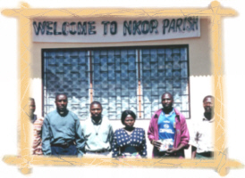 Part of the welcome committee that met Pat Connor, a trustee, on a visit to Nkor
